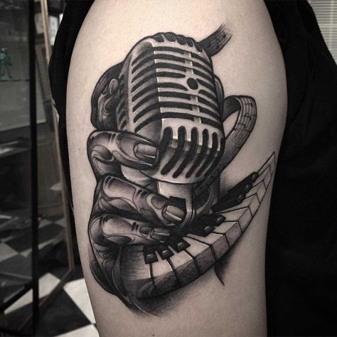 a vintage microphone tattoo  on shoulder Mic Tattoo, Dj Tattoo, Piano Tattoo, Microphone Tattoo, Music Tattoo Sleeves, Music Notes Tattoo, Music Tattoo Designs, Note Tattoo, Chest Tattoo Men