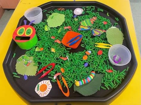 Hungry Caterpillar Sensory Tray, Spring Tuft Tray Ideas, The Very Hungry Caterpillar Eyfs Tuff Tray, Hungry Caterpillar Messy Play, Sensory Tough Tray, The Very Hungry Caterpillar Tuff Tray, Minibeasts Tuff Tray, The Hungry Caterpillar Eyfs, Hungry Caterpillar Tuff Tray Ideas