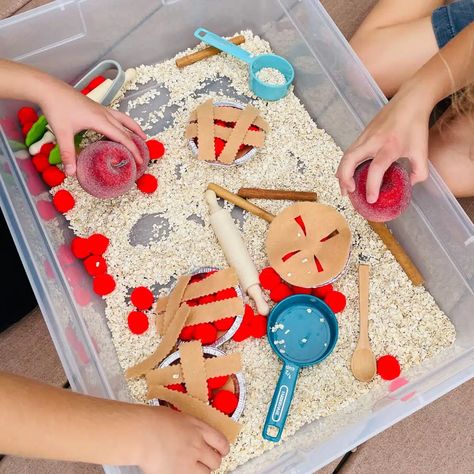 Looking for an easy Apple sensory bin for fall? This apple pie sensory bin for preschoolers is perfect! Little ones will enjoy scooping, pouring, and creating their own little pies! What fun! Check out this apple pie sensory table idea today. Apple Pie Sensory Bin, Apple Sensory Bin Preschool, Sensory Table Ideas For Preschool, Sensory Bins For Preschool, Apple Sensory Bin, Pie Sensory Bin, Sensory Bin For Preschoolers, Apple Sensory, Sensory Table Ideas