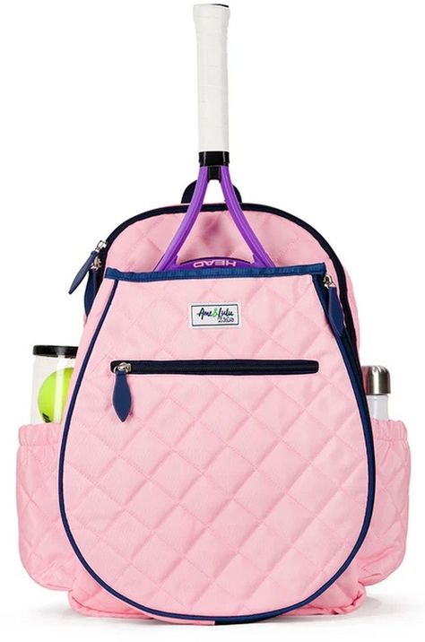 The Ame & Lulu Big Love Tennis Backpack screams game, set, match. With a racquet shaped pocket, this tennis backpack is functional and fun all at the same time.Features:NylonPadded, adjustable strapZip closureTwo exterior water bottle pocketsExterior zip pocketInterior zip pocketNylon linerDimensions:11”L x 4”W x 15.5”HThe Ame & Lulu Big Love Tennis Backpack fits ages 7-11 years old. Tennis Tote, Indoor Tennis, Tennis Backpack, Game Set Match, Tennis Equipment, Tennis Gear, Tennis Bags, Tennis Bag, Senior Activities