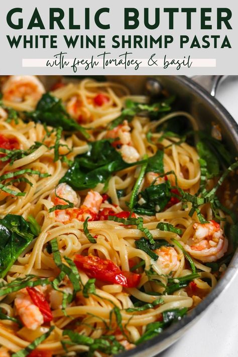 A pan of linguine with shrimp, tomatoes and spinach tossed in garlic butter white wine sauce and topped with fresh basil ribbons Shrimp Tomato Spinach Pasta In Garlic Butter Sauce, Shrimp Pasta With White Wine Sauce, White Wine Garlic Shrimp Pasta, Shrimp Scampi Pasta With Spinach, Lemon Shrimp Fettuccine Garlic Butter, Shrimp Linguine White Wine Sauce, White Wine Lemon Butter Sauce Pasta Shrimp Linguine, Shrimp Pasta Wine Sauce, Vodka Sauce With Shrimp