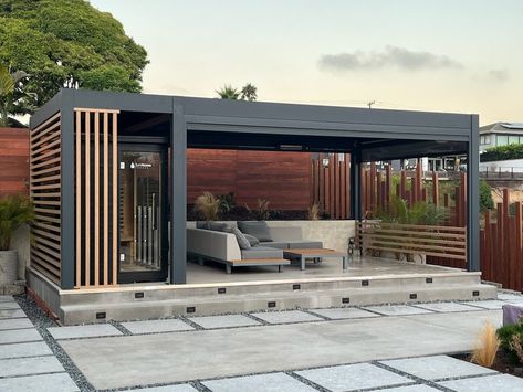 Backyard just got a serious upgrade! Our Weatherproof Pergola with louver lighting sets the perfect vibe, no matter the weather. Day or night, rain or shine. 🌴🌞#bonpergola #pergola #outdoorliving #louverpergola #patiocover Aluminum Pergola Patio Ideas, Pagola Ideas Pergolas, Raised Pergola, Pagola Ideas, Shaded Pergola, Modern Pergola Ideas, Contemporary Pergola, Backyard Goals, Steel Pergola