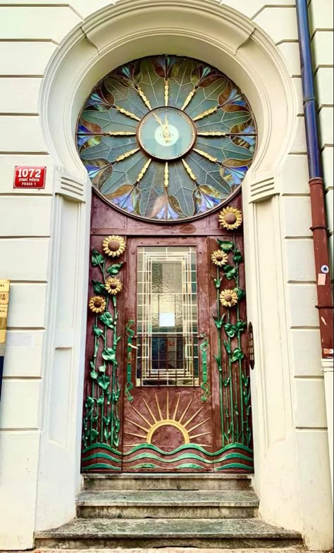 " Sunflower and clock door " of the apartment building in Haštalská street 6, Prague, Czech Republic Architects: Osvald Polivka & Václav Haver . 1900. ( Photo : Jo Miller ) Morrocan Doors, Decorated Doors, Art Nouveau Arquitectura, Sunflower Door, Cellar Door, Cool Doors, Antique Doors, Prague Czech Republic, Prague Czech