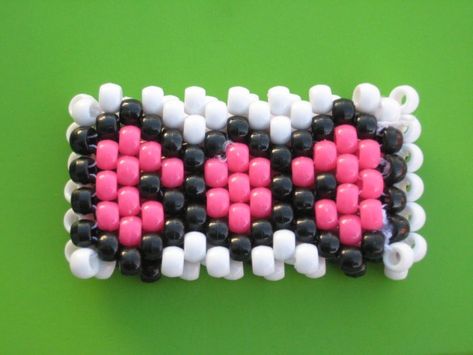 Hello Kitty Kandi Cuff, Sanrio Perler Bead Patterns, Kandi Patterns Cuff, Hello Kitty Kandi, Bead Kandi, Scene Kandi, Kandi Cuff Patterns, Kandi Inspo, Diy Kandi Bracelets