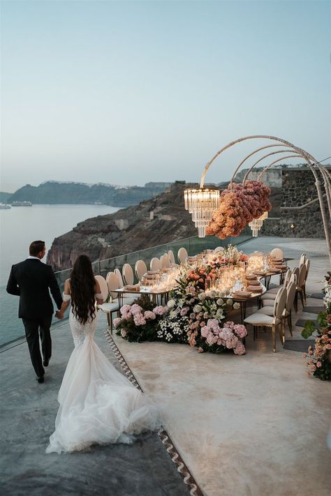 The most glamorous cliffside wedding reception in Mikonos, Greece | Image by Phosart Weddings In Santorini, Pink And Green Wedding, Santorini Wedding Venue, Cliffside Wedding, Cliff Wedding, Dream Wedding Reception, Europe Wedding, Santorini Wedding, Greek Wedding