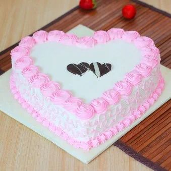 Cake Flavour- Strawberry  Type of Cake - Cream Weight- 1 Kg Shape- Heart  Serves- 10-12 People Size- 9 inches in Diameter Candles & Knife Included Cake For Wife, Birthday Cake For Wife, Heart Cake Decoration, Heart Cake Design, Heart Shaped Cake, Online Cake Delivery, Heart Shaped Chocolate, Heart Cakes, Friends Cake