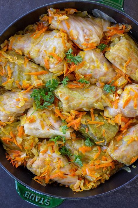 Whether you're skipping out on meat for the day or a hardcore vegetarian, these vegetarian cabbage rolls won't disappoint. So savory & tasty! Veggie Cabbage Rolls, Vegetarian Stuffed Cabbage, Vegetarian Cabbage Rolls, Vegan Cabbage Rolls, Easy Stuffed Cabbage, Cabbage Roll Casserole, Stuffed Cabbage Rolls, Sauteed Carrots, Cabbage Roll Soup