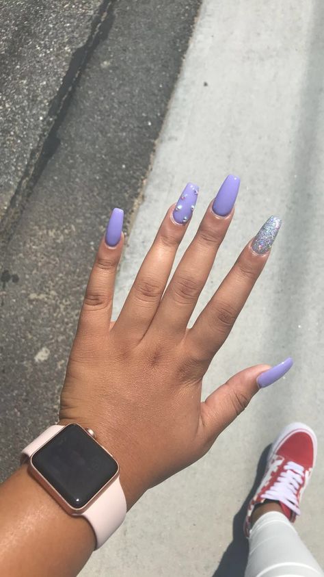 Lavender Acrylic Nails With Rhinestones, Purple Nails With Gems, Purple Nails With Rhinestones, Purple With Sparkle Nails, Short Purple Acrylic Nails With Rhinestones, Purple Sparkle Nails, Purple Hoco Nails, Light Purple Sparkly Acrylic Nails, Pink And Purple Nails With Rhinestones