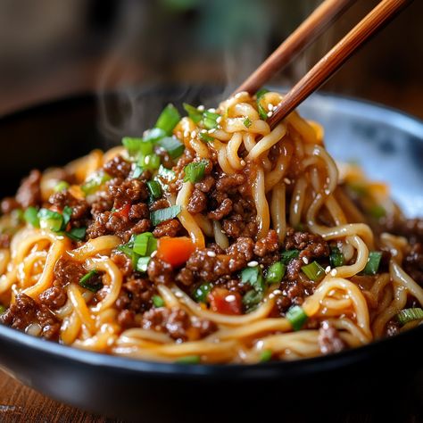 Quick and easy Mongolian Ground Beef Noodles featuring savory beef, garlic, and a flavorful soy-based sauce. Perfect for a weeknight. Honey Garlic Beef, Mexican Chicken Spaghetti, Mongolian Ground Beef Noodles, Fried Cheese Bites, Ground Beef Noodles, Mongolian Ground Beef, Brown Sugar Meatloaf, Chicken Pinwheels, Spanish Rice Recipe