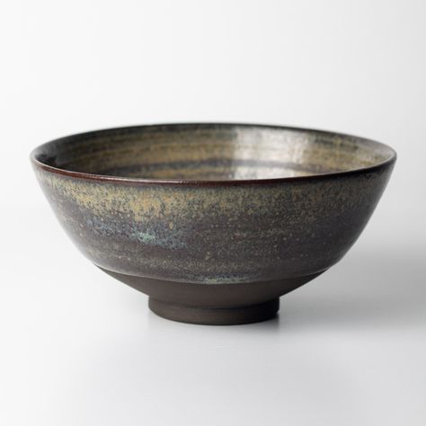 This ocean bowl lived up to its name and traveled overseas to the customer in America. I'm still trying to find glazes that work well with this dark clay, but it's a long process. I will definitely try more pieces with this glaze though. What do you think about this effect? #keramika #ceramics #pottery #amaco #bowl #wheelthrown #potter #pottersofinstagram #ceskakeramika #rucnivyroba #handmade #wheelthrownceramics #potterystudio #ceramicsofinstagram #minimalpottery #glaze #stoneware #vyrobeno... Wheel Thrown Ceramics, Overseas Travel, Earthy Brown, Breakfast Bowl, Footed Bowl, Functional Pottery, Circular Pattern, Breakfast Bowls, Pottery Studio