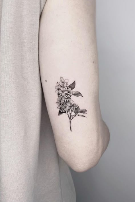 Beautiful Lilac Tattoos: Ideas, Designs, and Meanings Lilac Tattoo Black, Lilac Bouquet Tattoo, Small Lilac Tattoo Black And White, Simple Lilac Tattoo Black And White, Lilac Sleeve Tattoo, Flower Tattoos Lilacs, Simple Lilac Tattoo, Lilac Bush Tattoo, Black And Grey Lilac Tattoo