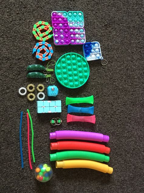 Figet Toys Aesthetic, Classroom Fidgets, Tangle Fidget Toy, Calm Down Box, Fidget Board, Fidget Tools, Sensory Items, Figet Toys, Prize Box