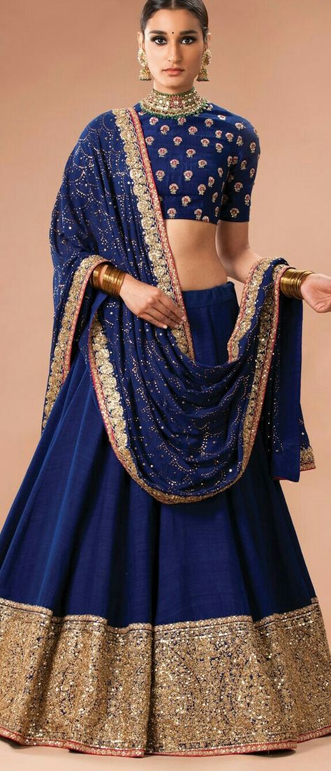 This traditional blue and golden lehenga is beautiful and perfect for your engagement or sangeet! // sangeet outfit ideas for indian weddings #indianwedding #weddingideas #weddingday #indianwear #bridalwear #blue #embriodery #lehenga #lehengadesigns Blue Golden Lehenga, Indian Bridal Lehenga Blue, Blue And Golden Lehenga, Sangeet Outfit Ideas, Crop Top Dresses, Dark Blue Lehenga, Best Bridal Lehenga, Lehenga Bride, Golden Lehenga