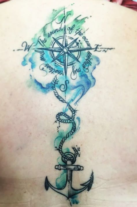 Awesome back tattoo for the ocean lover. I like the styling of the compass rose but almost wonder if the rope and anchor where added at a later date. Either way it makes a nice cohesive piece of art especially with the watercolor bringing it together. #ink #tattoo #tattooideas #nauticaltattoo #compassrosetattoo #anchortattoo #inspirationalquotetattoo #backtattoo #sidetattoo #beach #ocean #nautical Compass And Anchor Tattoo, Black Anchor Tattoo, Steve Tattoo, Watercolor Compass Tattoo, Nautical Compass Tattoo, Compass Rose Tattoo, Anchor Tattoo Design, Anker Tattoo, Compass Tattoo Design