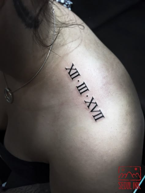 Roman Numerals Shoulder Tattoo, Roman Numbers Tattoo Women Shoulder, Shoulder Tattoo Roman Numerals, Shoulder Roman Numeral Tattoo, Roman Numeral Tattoo On Neck, Roman Numeral Tattoo On Ribs, Roman Numeral Tattoos For Women, Roman Numeral Tattoo On Shoulder, Greek Numbers Tattoo