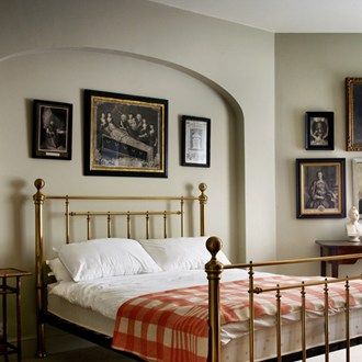 In the spare bedroom, a gallery wall of antique pictures has been coupled with a brass bed-frame and gingham bedspread. English Country Bedroom, English Bedroom, Bedroom Marble, Brass Bed Frame, Living Colors, Brass Bed, Cottage Bedroom, Country Bedroom, Spare Bedroom