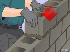 Laying Concrete, How To Lay Concrete, Building A Retaining Wall, Concrete Block Walls, Cinder Block Walls, Brick Laying, Concrete Diy Projects, Concrete Bricks, Brick Block