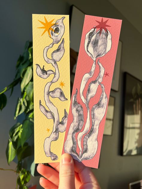 ❤︎Blooming Nature Bookmarks❤︎ Some bookmarks featuring blooming tulips, some plants that can see, and colorful stars of whimsy. Art print of digital illustrations by yours truly, printed on premium matte textured 200gsm paper! Each bookmark measures 2x8". 3 options available:       * red      * yellow      * set *Colors may appear different in person* Thank you for supporting! Bookmarks Nature, Bookmark Illustration, Bookmark Art, Art Fair Booth, Homemade Bookmarks, Bookmark Design, Whimsy Art, Nature Bookmarks, Diy Bookmarks