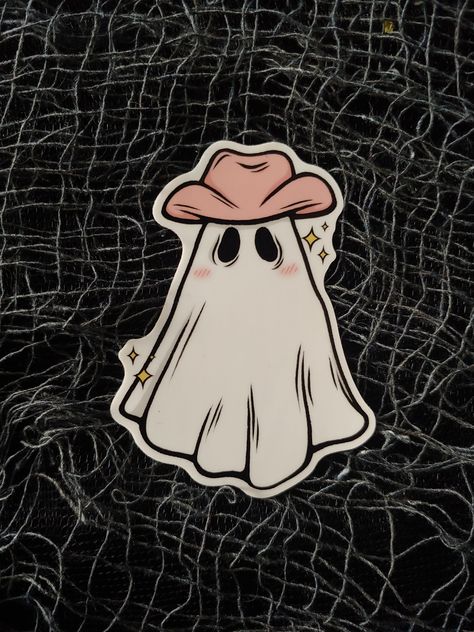 Original waterproof vinyl sticker of a cute spooky ghost wearing a pink cowboy hat. The sticker is 2x3 and arrives in a sturdy envelope to ensure safe travel. Stickers are printed without a watermark and has a glossy finish. Great for laptops, car bumpers, water bottles, and more! If you have any questions, comments, or concerns feel free to contact me at atlaeusarts@gmail.com! Cowgirl Ghost Tattoo, Ghost With Cowboy Hat, Cowboy Boots Drawing, Cowboy Hat Sticker, Cowboy Hat Drawing, Ghost Cowboy, Cute Spooky Ghost, Cowboy Halloween, Matching Tats