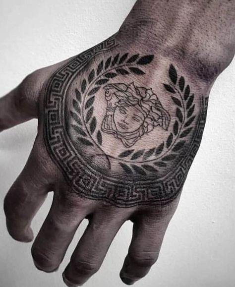 Medusa Tattoos: What Do They Symbolize? (With Images) Versace Tattoo, Tattoo Main, Herren Hand Tattoos, Medusa Tattoo Design, Flower Tattoo Shoulder, Neck Tattoo For Guys, Medusa Tattoo, Incredible Tattoos, Greek Tattoos