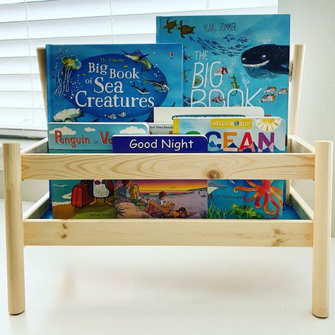 Ikea Flisat Book Display, Flisat Book Display, Ikea Playroom, Ikea Flisat, Ocean Books, Ocean And Beach, Montessori Room, Beach Books, Toy Storage Organization