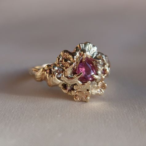 Bespoke Garnet ring with vintage diamonds and pink sapphires set within a bouquet of flowers and vines. 🌸 Garden jewellery statement woodland handcrafted engagement & wedding rings fairy fae custom leaf & floral designs twig floral botanic fairy magic whimsical bridal australian sappphire pink sapphire 9ct gold Whimsical Wedding Ring, Whimsical Engagement Ring, Pink Garnet, Wax Ring, Garnet And Diamond Ring, Fairy Ring, Gold Flower Ring, Flower Meadow, A Bouquet Of Flowers