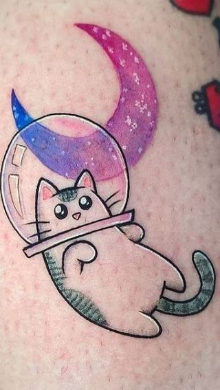 Colored Cat Tattoo, Cute Cat Tattoo Designs, Cartoon Cat Tattoo Ideas, Kitty Cat Tattoos, Cosmic Cat Tattoo, Feminine Cat Tattoos, Trippy Cat Tattoo, Cat Sketch Tattoo, Cat Couple Tattoo