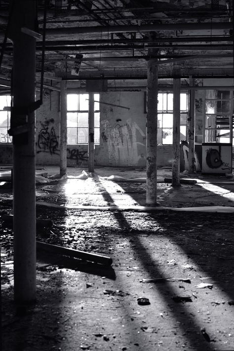 An abandoned mill with light coming in through the window and creating long shadows. Spaces Photography, Abandoned Urban Places, Past Photography, Abandoned Place Aesthetic, Rebuilding Photography, Spaces And Places Photography, Forgotten Places, Abandonment Photography, Forgotten Things Photography