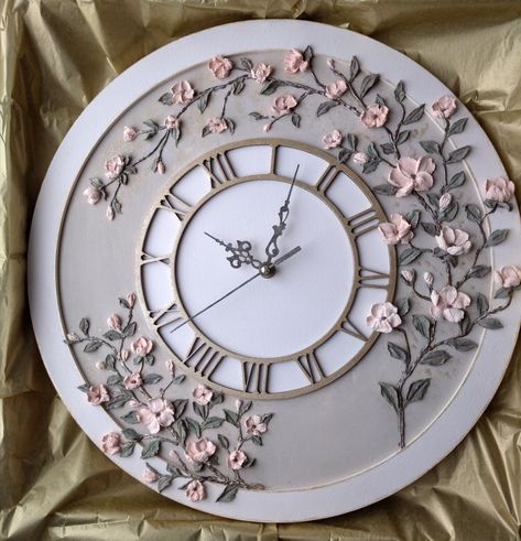 Wall clock in pale pink and gray with 3D pink sakura. The dial is painted with golden paint. Sakura branches and arrows are slightly tinted with golden paint.
The clock is made of plywood, painted with acrylic paint.The flowers are made of decorative paste in the technique of volumetric painting with a palette knife. Wall Art Woth Clock, Handmade Wall Clock Diy, Clock Painting Acrylic, Resin Art Clock Design, Clay Clock, Sculpture Painting Clock, Sculpture Painting Wall Clock, Resin Clock On Mdf, Pink Grey Wall