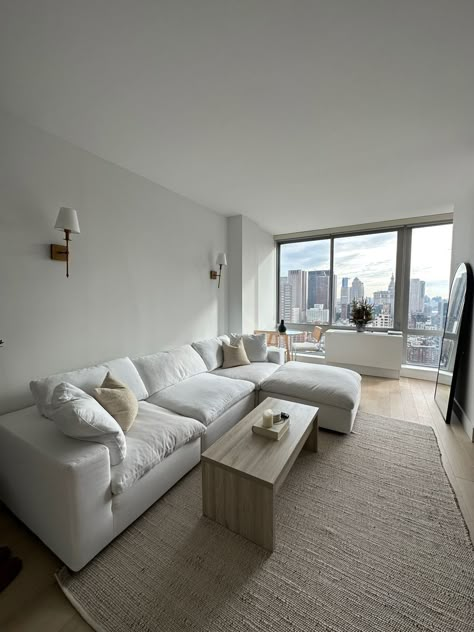 White Couch Inspiration, White Sofa Apartment, White Small Apartment Aesthetic, Nyc Living Room Ideas, White Cloud Couch Living Room Decor, Sectional Sofa Apartment, White Aesthetic Living Room Ideas, White Couch Living Room Apartment, Apartment Couches Ideas