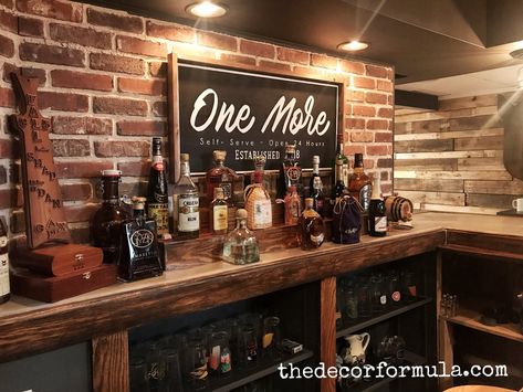 The Details of Our Basement Remodel — The Decor Formula Basement Bar Sign Ideas, Bar Remodel Ideas Basement, Basement Wall Ideas Decor, Diy Speakeasy Basement, 60s Basement Remodel, Pub Wall Design, Basement Bar Wall Decor, Basement Bar Decor Ideas, Basement Bar Wall Ideas