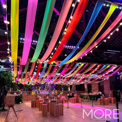 Carnival Lights Decoration, Colorful Event Design, Streamers Across Ceiling, Ceiling Party Decor Ideas, Ceiling Streamers Ideas, Streamer Ceiling Decorations, Ceiling Event Decor, Streamers Decorations Ceiling, Birthday Venue Decoration