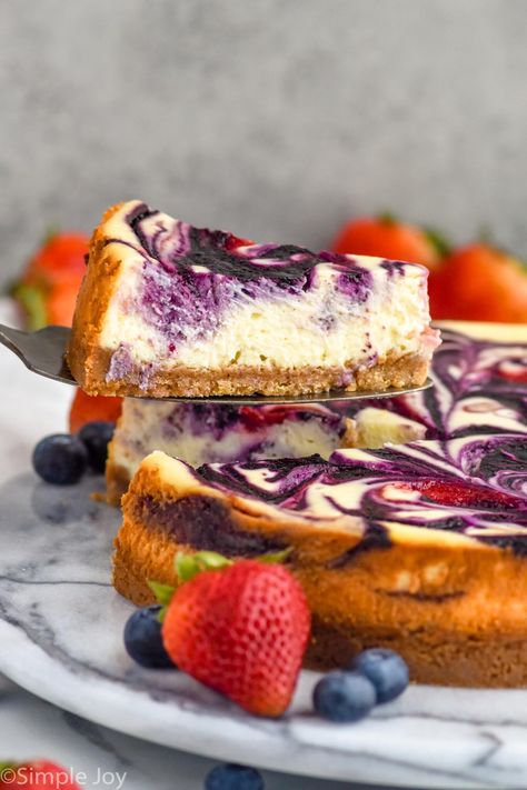 This Berry Cheesecake, with ribbons of fresh strawberries and blueberries, is perfect for summer celebrations. The creaminess of the cheesecake and the sweetness of the fruit pair in the best way. Strawberries And Blueberries, Swirl Cheesecake, Berry Cheesecake, Summer Celebration, Fresh Strawberries, Strawberry Cheesecake, The Fruit, Fresh Strawberry, Chocolate Desserts