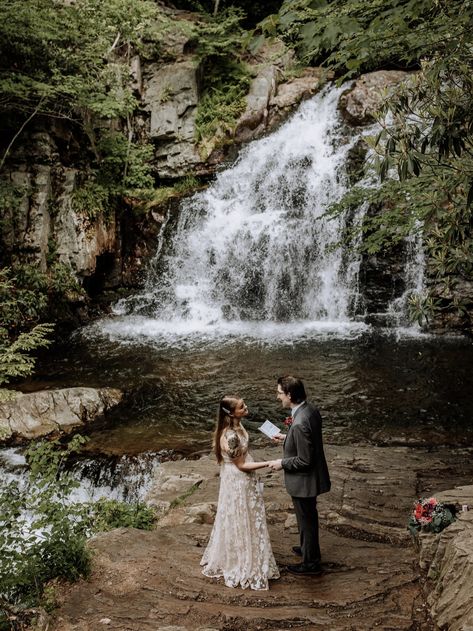 wedding couple exchanging vows in front of waterfall Wedding In Front Of Waterfall, Waterfall Elopement Photography, Waterfall Wedding Ceremony, Waterfall Wedding Photos, Fairytale Elopement, Waterfall Proposal, Wedding Waterfall, Eloped Wedding, Moon Ceremony