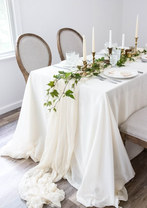 Ivory Chiffon Table Runner, White Table Cloth With Runner, White Table Cloth With Cheese Cloth Runner, Greenery And Neutrals Wedding, White Gauze Table Runner, Wedding Table Cloth Ideas, White Tablecloth Wedding, Wedding Table Cloth, Table Cloth Wedding