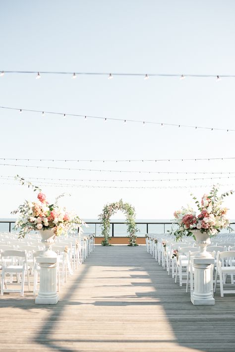 Wedding Ceremony Photos at Gurneys Montauk. Outside Wedding Ceremony Overlooking the Ocean on the Forward Deck at Gurney's Resort and Seawater Spa in Montauk, NY. Gurneys Montauk Wedding Photos. Beach Wedding Photos. Hamptons Wedding Photographer.     #montauk #hamptonsweddingphotographer #gurneysmontauk #nycweddingphotographer Hamptons Wedding Reception, Gurneys Montauk Wedding, Hamptons Beach Wedding, Beach Deck Wedding, Deck Wedding Ceremony, Outside Wedding Ceremony, Deck Wedding, Gurneys Montauk, Outside Wedding Ceremonies