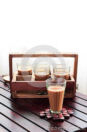 #Tea Glasses - Traditional Indian way of Drinking Tea. A Glass of Tea in the Front and Tea Glass Stand with Other Glasses in the Background  #Dreamstime Tea Glass Indian, Glass Of Tea, Tea Glasses, Tea Lovers, Drinking Glass, Traditional Indian, V60 Coffee, Indian Food, Tea Lover