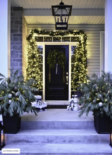 Christmas Front Porch Decor with Fresh Greenery - CitrineLiving Outdoor Christmas Decorations Modern, Outdoor White Lights Christmas, Modern Front Door Christmas Decor, Modern Christmas Decor Outdoor, Pottery Barn Christmas 2023, Modern Outdoor Christmas Decor, Porch Christmas Lights, Pottery Barn Christmas, Front Door Christmas Decorations