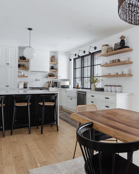 Black Wood And White Decor, Black Wood Aesthetic Home, White Kitchen Black Table, White And Black With Wood Accents, Black White And Wood House Decor, White Black Natural Wood Kitchen, Black And White Open Kitchen, White Kitchen With Dining Table, White Black And Wooden Kitchen