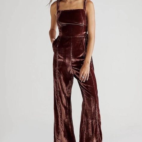 Free People 90s Forever Overall In Garnet Velvet Size Xs Retail $168 Your Favorite Retro Silhouette With A Contemporary Twist. Fit: Slim Fit At The Bodice And Thigh With Kick Flare Leg Design Features: Square Neckline, Lace-Up Detailing At The Sides, Soft Velvet Fabrication, Side Pockets Forever Flattering For Every Occasion, These Overalls Are Sure To Stun From Season To Season. Self: 75% Viscose, 25% Polyamide Lining: 100% Viscose Made In Vietnam Hand Wash Hidden Side Zipper Closure Side Slant Pockets Side Tie Detail Velvet Fabric Size: Xs Approx. Measurements: Flat Lay 13" Rise 13" Waist 30.5" Inseam 12.5" Leg *Inner Label Crossed Out To Prevent In Store Returns* New Without Tags. Gold Romper, Free People Jumpsuit, Garnet Color, Free People Romper, Boho Jumpsuit, Velvet Jumpsuit, Flare Jumpsuit, Wrap Romper, Blue Jumpsuits