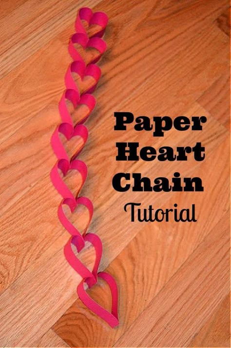 DIY Paper Heart Chain For Valentine’s Day- step by step directions for making a heart paper chain with photos and video. #heartcrafts Heart Chain Craft, Paper Heart Chain, Hearts Paper Crafts, Paper Heart Garland, Valentine Garland, Diy Valentine's Day Decorations, Paper Chain, Heart Paper, Heart Diy