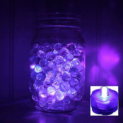 Because these tea lights are waterproof, throw them in your party ice tub for a festive glow! Use them with Aqua or Water Beads for a Fun Look! Fill the bottom of a vase or mason jars with these little purple delights! Led Tea Lights Wedding, Bff Crafts, Tea Lights Wedding, Bridal Hair Tutorial, Purple Centerpieces, Black Wedding Decorations, Prom 2022, Color Lights, Engagement Favors