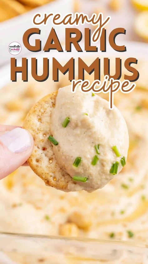 Looking for a delicious snack? You'll love this Creamy Garlic Hummus Recipe! It's made with fresh lemon juice, a can of chickpeas, extra virgin olive oil, flavorful garlic cloves, and just four simple seasonings. Check out the recipe via @soulfullymade.Check out the recipe via @soulfullymade.Check out the recipe via @soulfullymade. # # Hummus Recipe With Canned Chickpeas, Garlic Hummus Recipe Homemade, Hummus Recipe Garlic, Greek Hummus Recipe, Roasted Garlic Hummus Recipe, Easy Homemade Hummus, Creamy Hummus Recipe, Garlic Hummus Recipe, Best Hummus Recipe