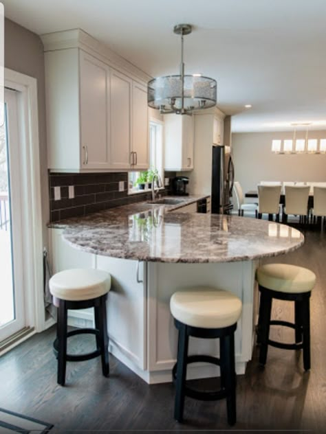 Kitchen Island Counter Design, Kitchen Layout With Bar Counter, Kitchen Counter With Table Attached, Kitchen Counter With Bar Top, Curved Kitchen Island Ideas U Shaped, Curved Kitchen Bar Counter, Kitchen With Raised Bar Counter Tops, Round Kitchen Counter, Oval Shaped Kitchen Island