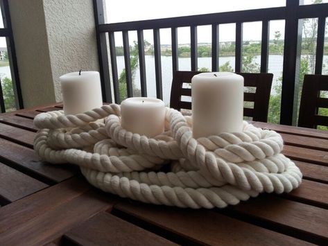 Nautical Candle Centerpiece - interesting way to create a centerpiece with rope.  Hmmmm.. Nautical Candle Centerpieces, Nautical Centerpiece Ideas, Nautical Centerpieces, Nautical Centerpiece, Nautical Candles, Nautical Bridal Showers, Deco Marine, Roman Candle, Candle Centerpiece