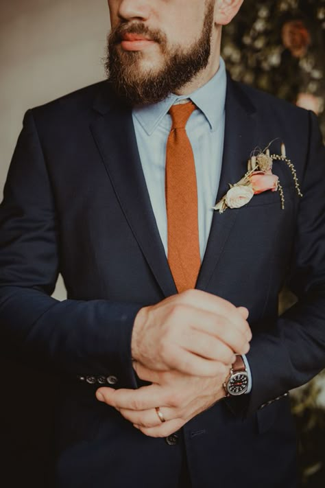 Navy Blue Tuxedo Wedding With Orange, Grey Suit Rust Tie Wedding, Navy And Burnt Orange Groomsmen, Black Suit With Rust Tie, Black Suit With Burnt Orange Tie, Black Tux Orange Tie, Navy Blue And Burnt Orange Wedding Suit, Groomsmen Attire Fall Color Combos, Navy Suit Orange Tie Wedding