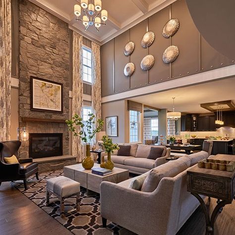 Tall Stone Fireplace, Tall Ceiling Living Room, Traditional Living Room Design, Two Story Great Room, Model Home Decorating, Traditional Design Living Room, High Ceiling Living Room, Wall Fireplace, Neutral Living Room