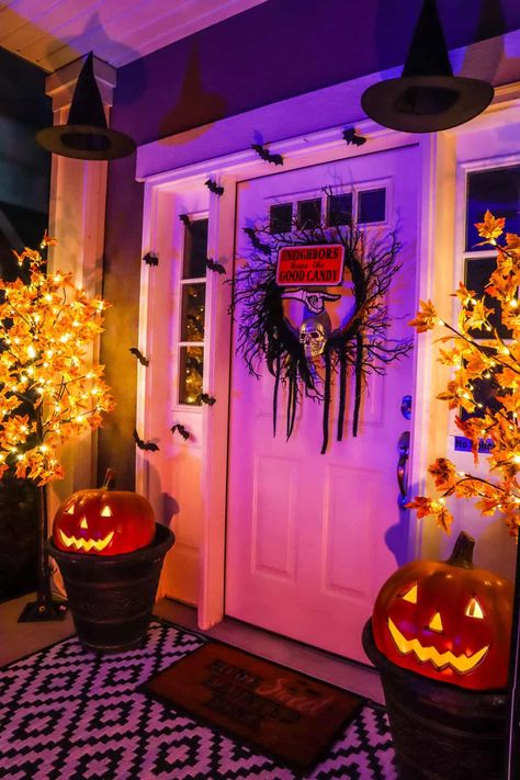 How to Decorate Your Front Porch for Halloween on a Budget: 21 Easy and Inexpensive Ideas - Practical Perfection Halloween Outside House Decorations, Front Porch Witch Decorations, Halloween Lights Outdoor Porch, Halloween Apartment Decor Front Doors, Halloween House Decorations Outdoor, Maxamilist House, Halloween Decorations Front Porch, Gothic Patio, Porch Halloween Decorations