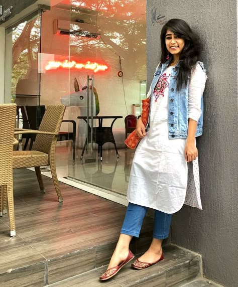 what a combination of indowestern outfits  kurta with denim jacket loved this idea chic n stylish  #whitekurta#denimjecket#denim Kurti With Jeans, Look Hippie Chic, Looks Jeans, Casual Indian Fashion, Long Kurti Designs, Office Wear Women, Outfits Dress, Salwar Kamiz, Trendy Dress Outfits