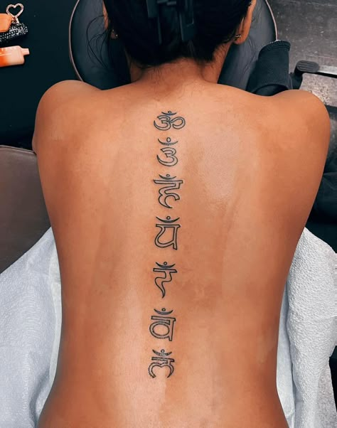 Sanskrit Spine Tattoo, Hindu Back Tattoo Women, Back Tattoo Women Spine Sanskrit, Buddhist Spine Tattoo, Back Tattoo Women Spirituality, Small Feminine Tattoos, Remember Tattoo, Ma Tattoo, Floral Back Tattoos